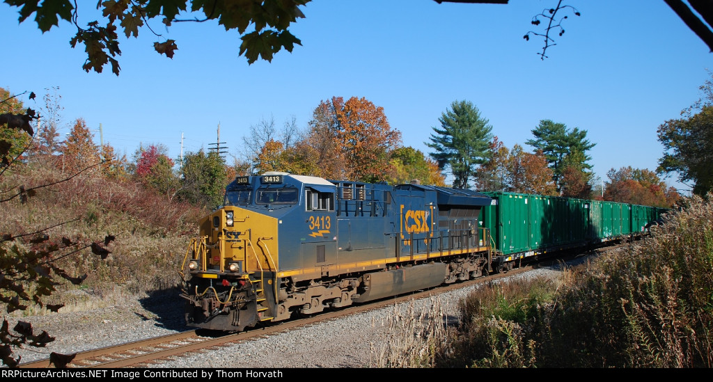 CSX 3413 leads Q301-08 west along the Trenton Line at MP 50